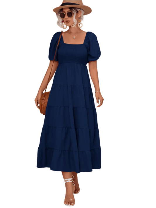 Chic Tiered Smocked Dress in navy, black, & hot pink. Perfect blend of elegance & comfort for any occasion. Shop now for timeless style!