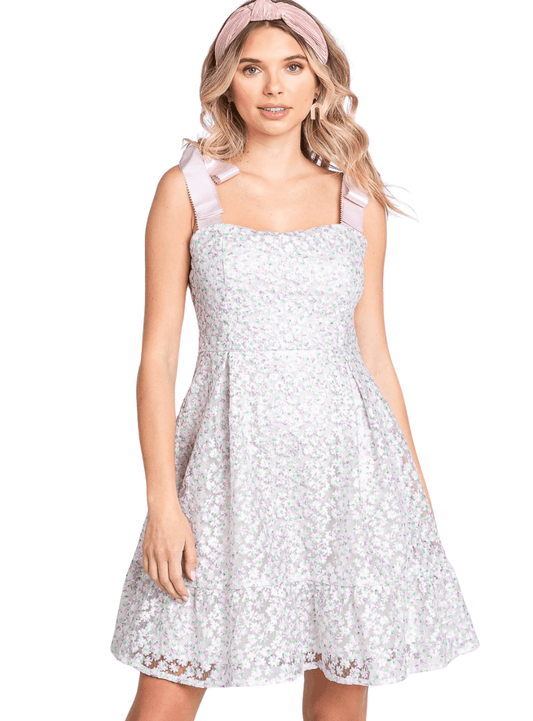 Elevate your spring wardrobe with our GeeGee Mesh Floral Embroidered Sleeveless Dress in lavender/mint. Perfect for any occasion.