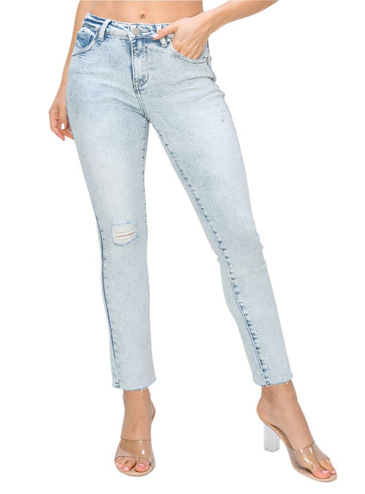 Light-wash high-rise skinny jeans with subtle distressed details on the thigh