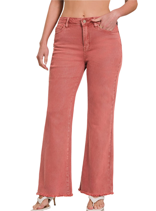 Front detail of acid washed bootcut jeans showing the texture and vintage-inspired design.