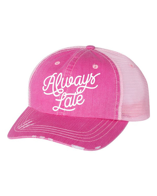 Distressed pink trucker hat with white Always Late embroidery