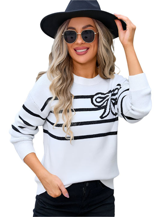 Woman wearing black Angel Wings striped round neck sweater with bow design