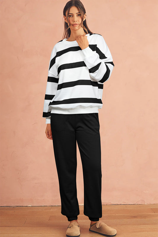 Comfortable two-piece black loungewear set with stripes