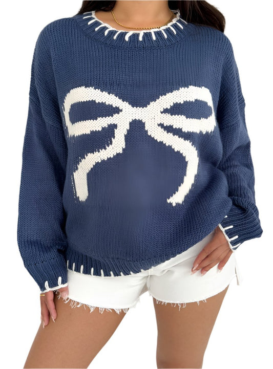 Front view of a blue bow-knot knit sweater, perfect for cozy winter days with a playful bow detail.