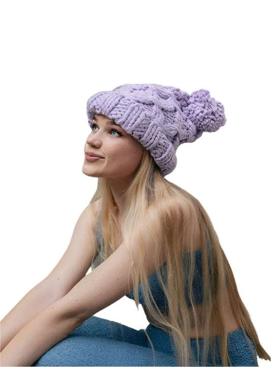 Oversized lavender beanie with thick knit pattern and matching pom