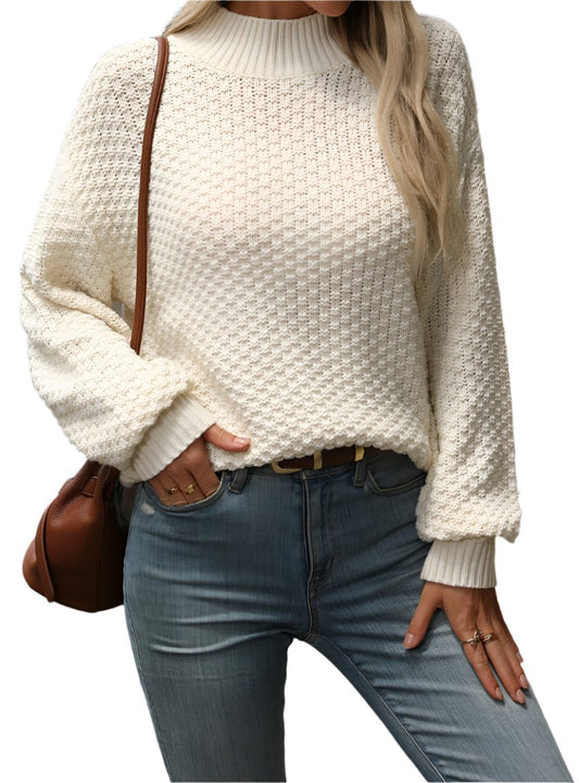 Cream mock neck sweater with cozy texture, shown styled casually
