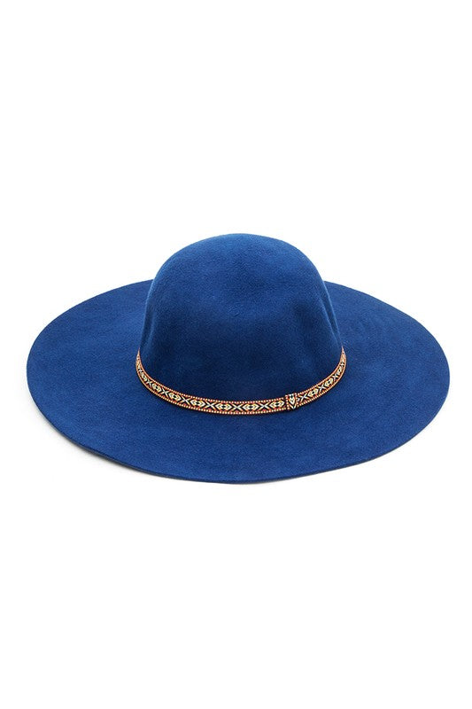 Elegant blue floppy hat featuring a wide 4-inch brim and trendy detailing.