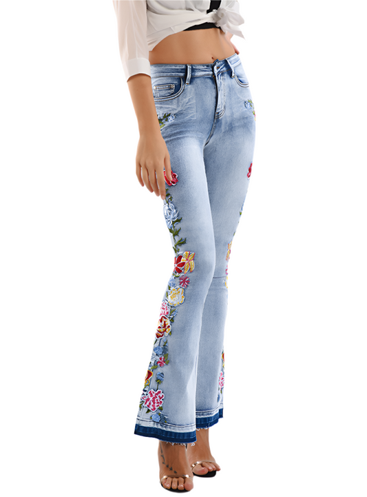 Front view of floral embroidered denim flare jeans with high waist.