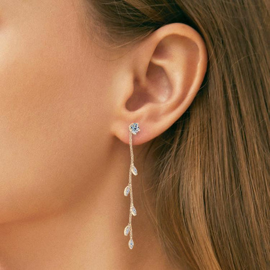 Gold moissanite leaf drop earrings with elegant design