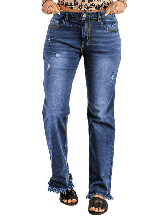 Front view of high waist distressed raw hem straight jeans in medium wash.
