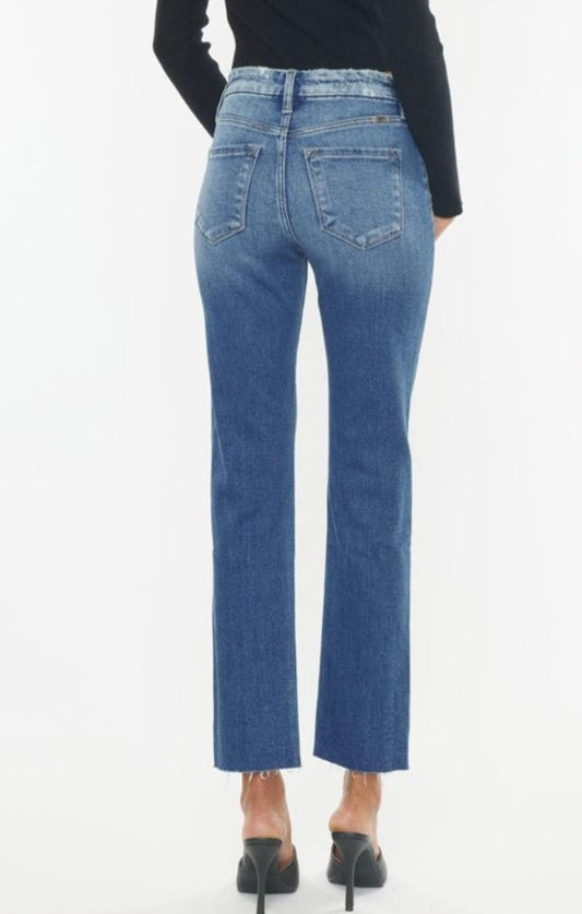 Back view of Kancan jeans featuring slim straight fit and raw hem design.