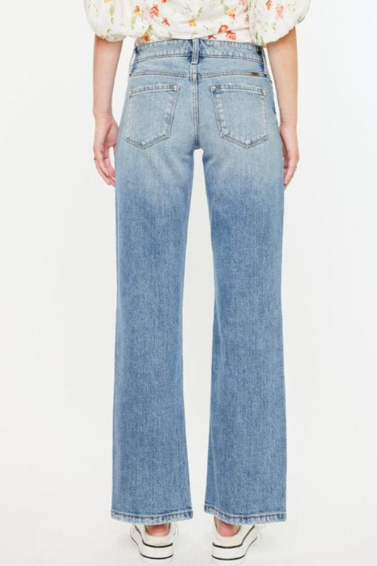 Back view of Kancan Mid Rise Frayed Hem Straight Jeans with pockets.