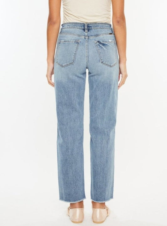 Back view of Kancan ultra high rise jeans with stylish raw hems.