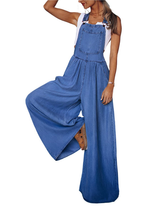 Front view of medium wash denim jumpsuit featuring wide-leg design.