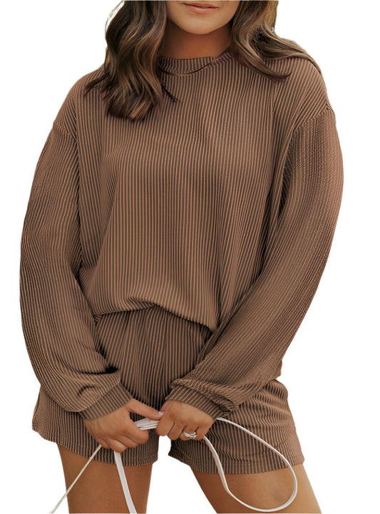 Woman wearing mocha corded two-piece shorts set with an oversized top.