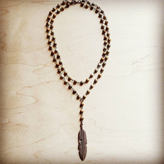 Natural gemstone lariat necklace with a feather pendant and genuine jasper beads.