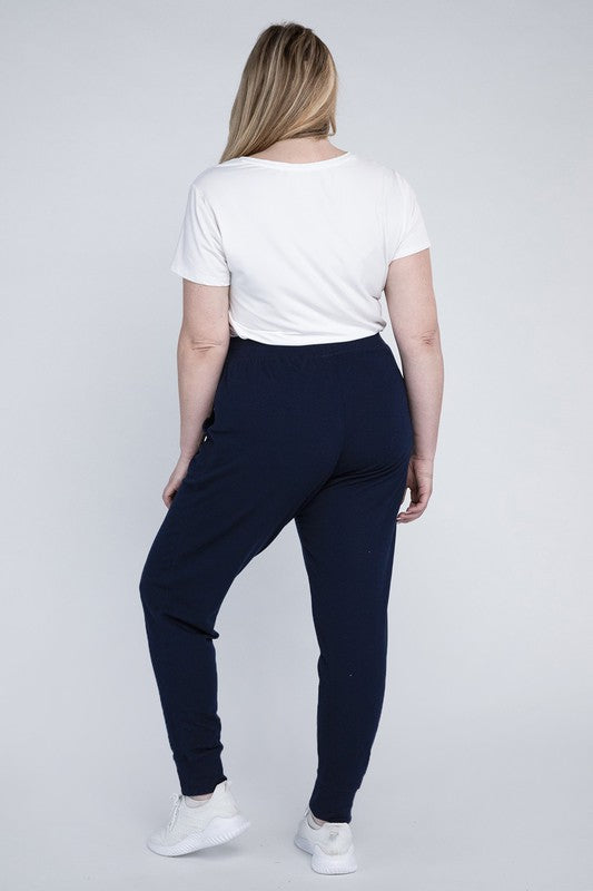 Plus-size ankle-length navy jogger pants with a relaxed silhouette.