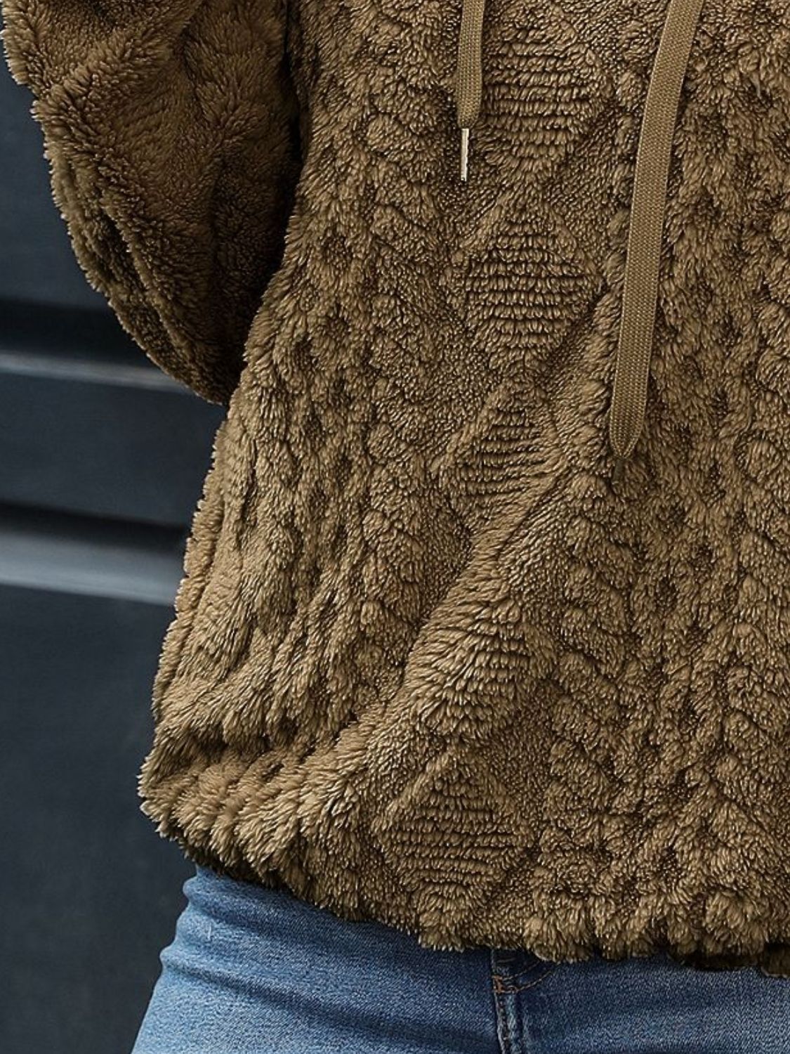 Chevron textured olive hoodie, perfect for a cozy winter outfit.