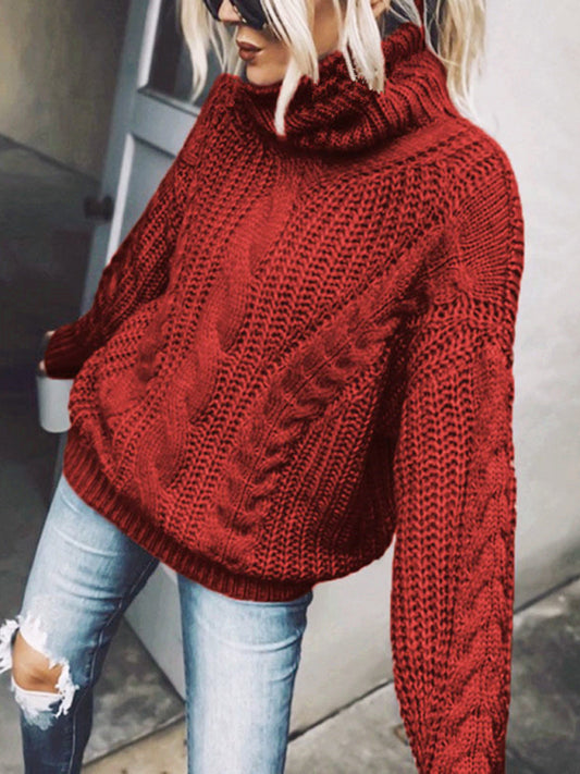 Front view of red cable knit turtleneck sweater with bold color and cozy fit