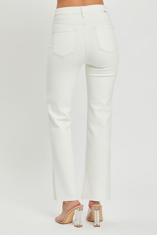 Cream-colored RISEN jeans with slight stretch and tummy control design.