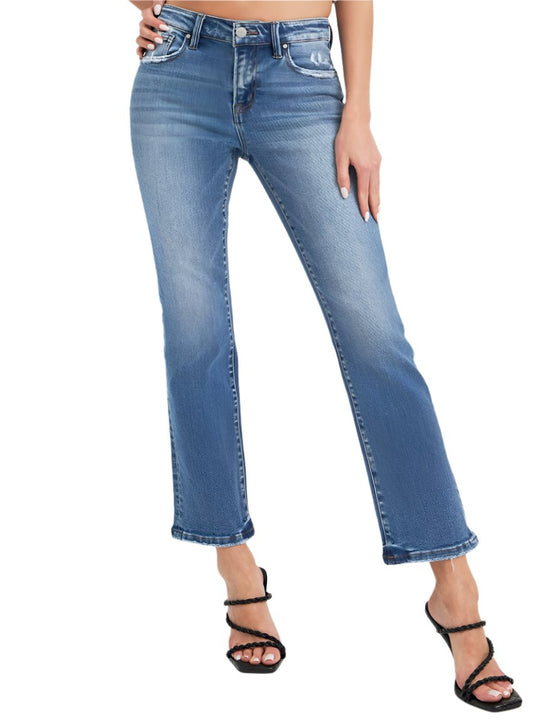 Front view of RISEN Mid Rise Ankle Straight Jeans styled with heels.