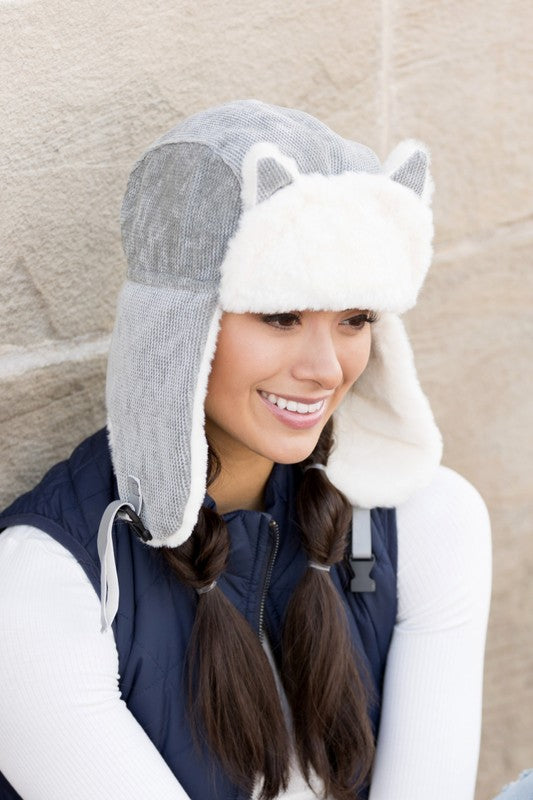 Snug kitten ear trapper hat with buckle closure