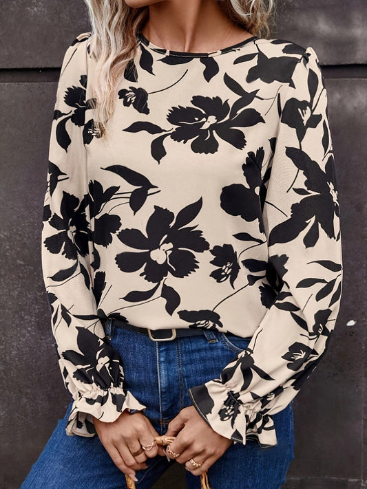 Stylish printed blouse with unique bow back