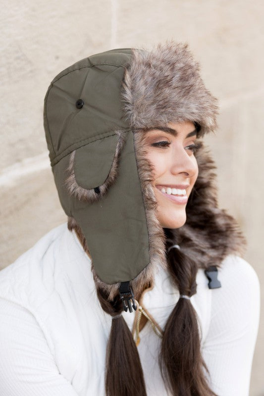 Stylish trapper hat with easy-clean nylon exterior