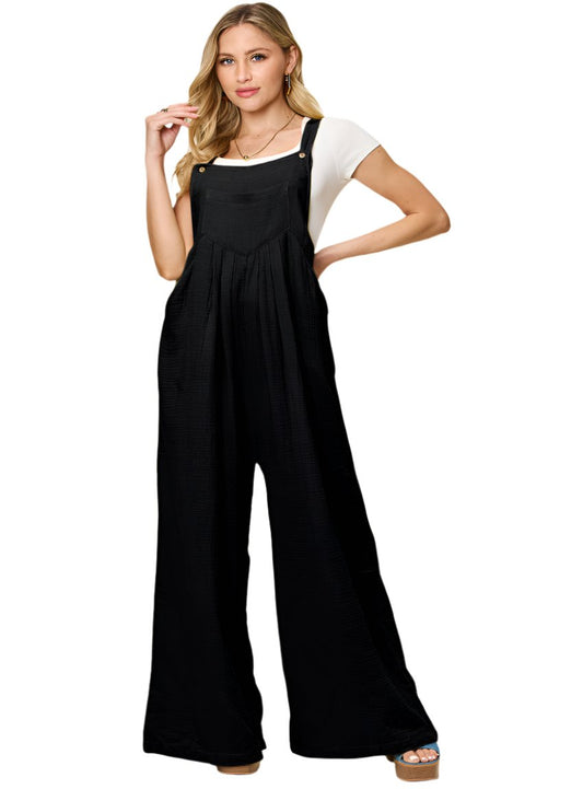 Black wide-leg cotton overalls featuring a breathable textured design.