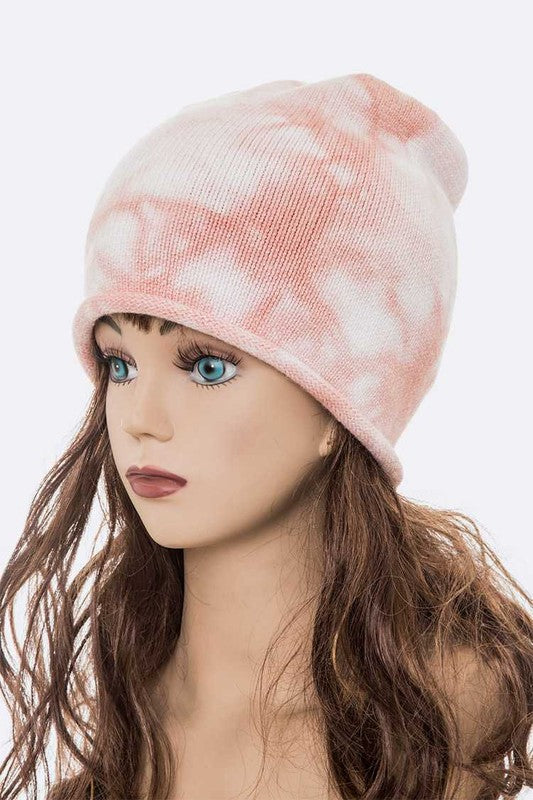 Peach and white tie dye knit beanie with soft roll edge detail