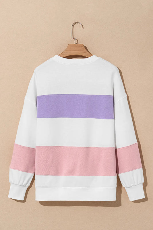 Relaxed fit color block sweatshirt in pastel colors, styled for fall.