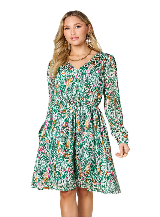 Tropical print dress in turquoise with ruched waist and button-front detail, perfect for warm weather.