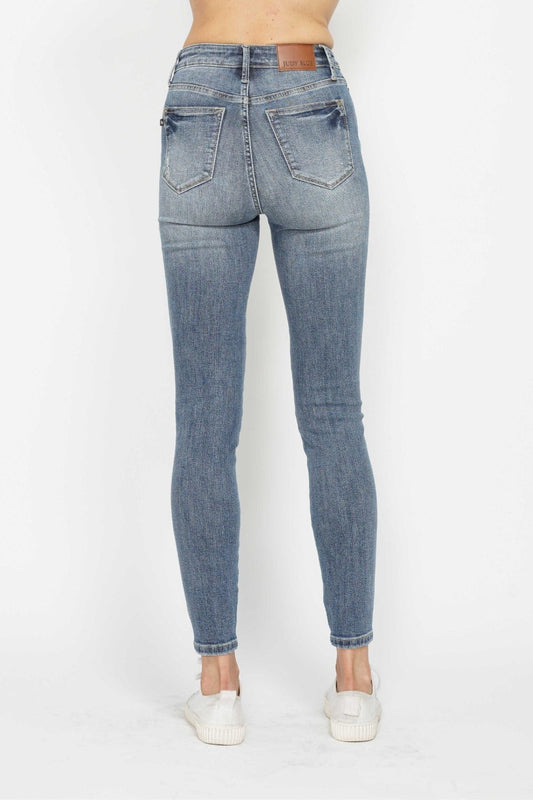 Back view of Judy Blue tummy control skinny jeans with contrast wash.