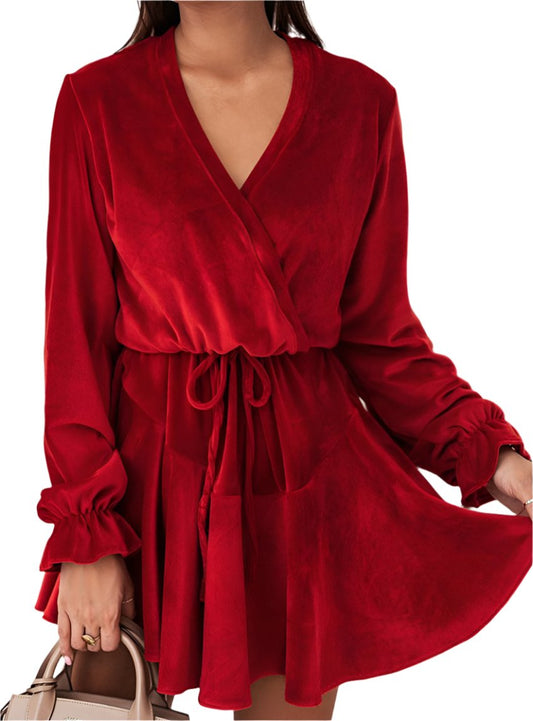 Red velvet party dress with a flattering tie waist and flowy skirt.