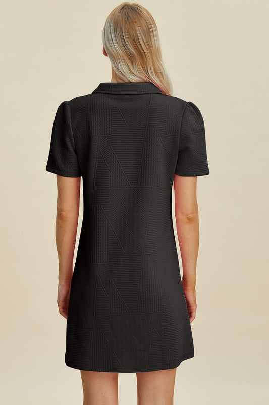 Chic black textured dress with short sleeves and collared design