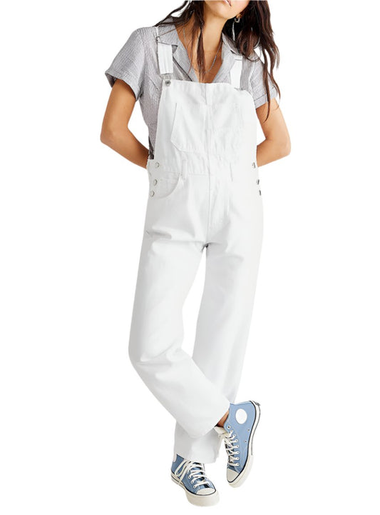 Front view of solid white cotton overalls with adjustable straps.