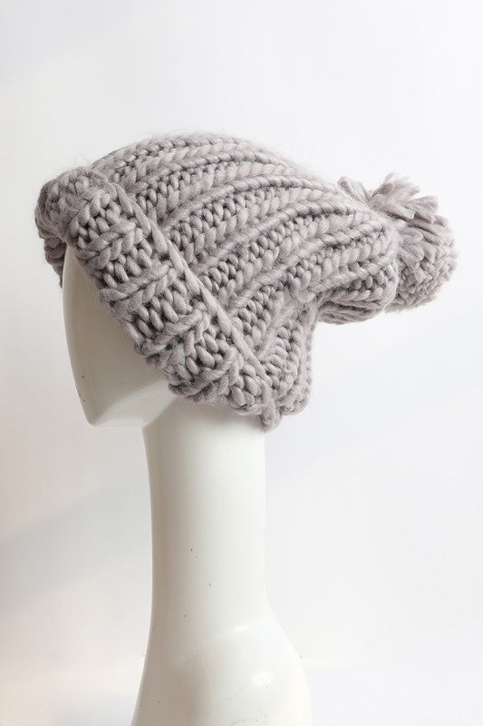 Gray cable knit beanie, crafted from 100% acrylic for warmth and comfort