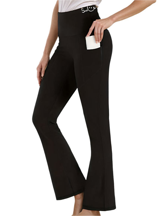 Women’s yoga pants in black, bootcut fit with functional side pockets.