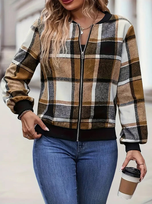 Plus-size caramel plaid zip-up jacket styled with dark pants for a relaxed outfit.