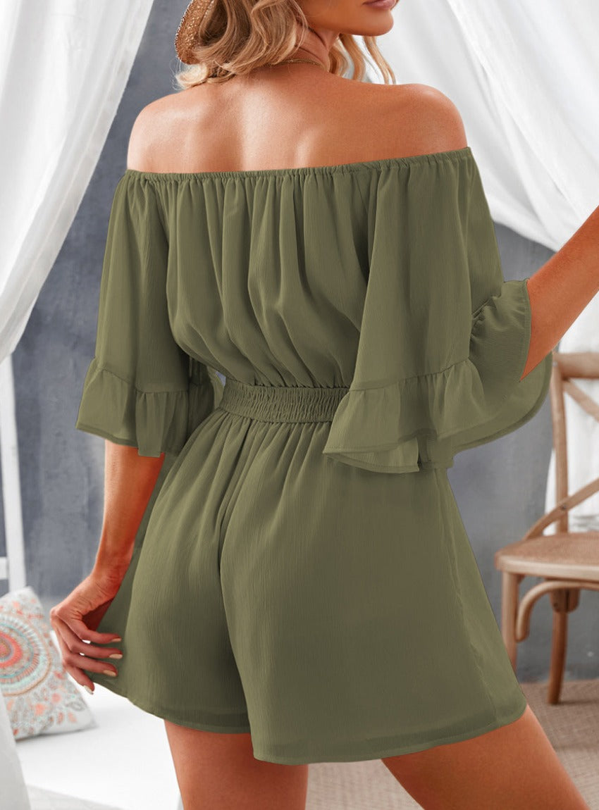 Chic off-shoulder romper with smocked waist and playful flounce sleeves, perfect for a stylish, effortless summer look.