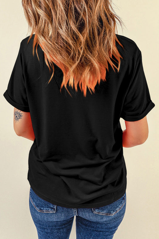 Black tee with a dazzling rhinestone heart in a baseball motif.