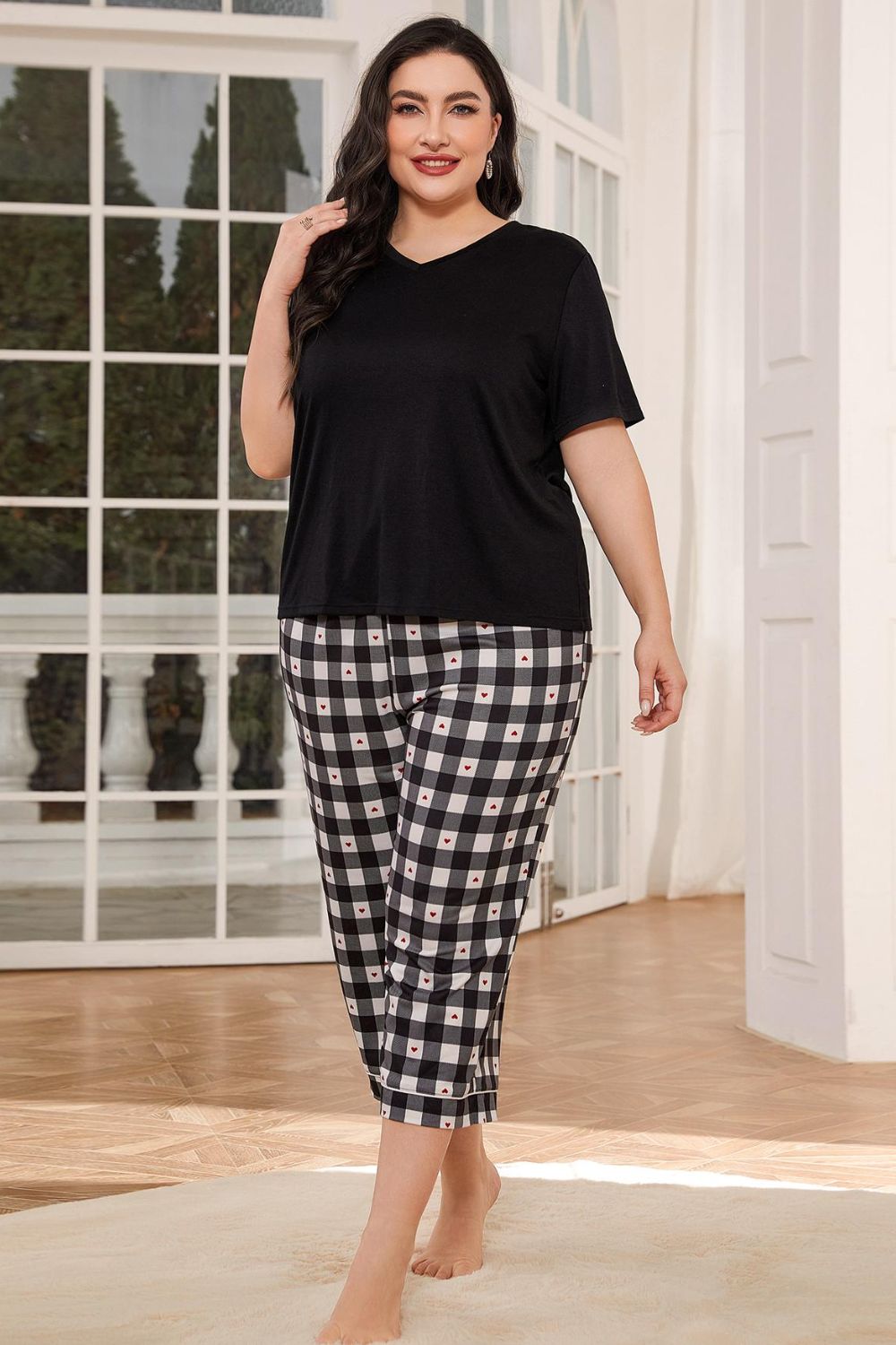 Lounge in style with our V-Neck Tee & Plaid Cropped Pants Set. Perfect blend of comfort and chic for everyday wear