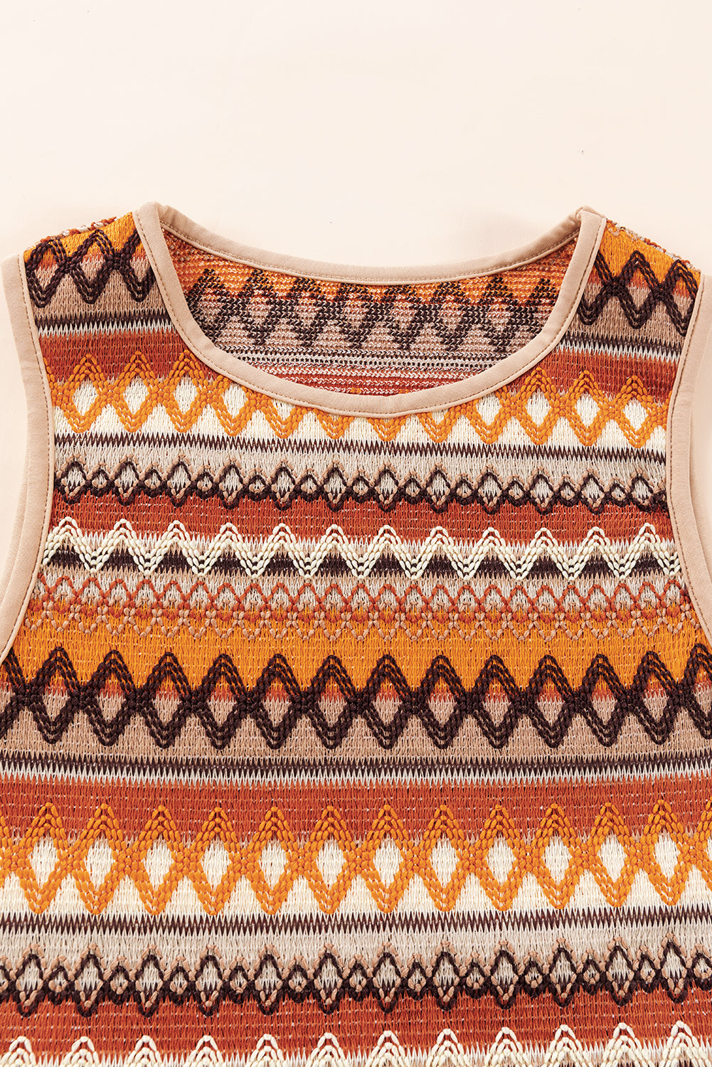 Earthy tones sleeveless top with geometric patterns