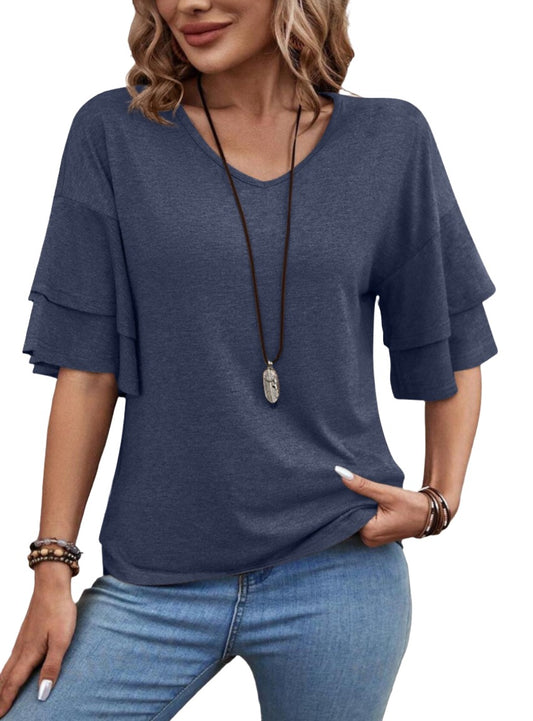 Blue flutter sleeve top with a relaxed fit and V-neckline.