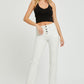 Mid-rise white jeans featuring a button-up closure by RISEN.