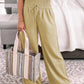 Wide-leg pants with a soft, breathable material in different colors.