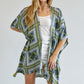 Geometric pattern kimono in blue and green with tassel accents