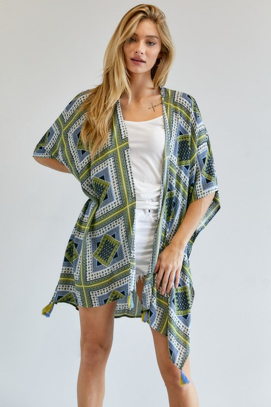 Geometric pattern kimono in blue and green with tassel accents