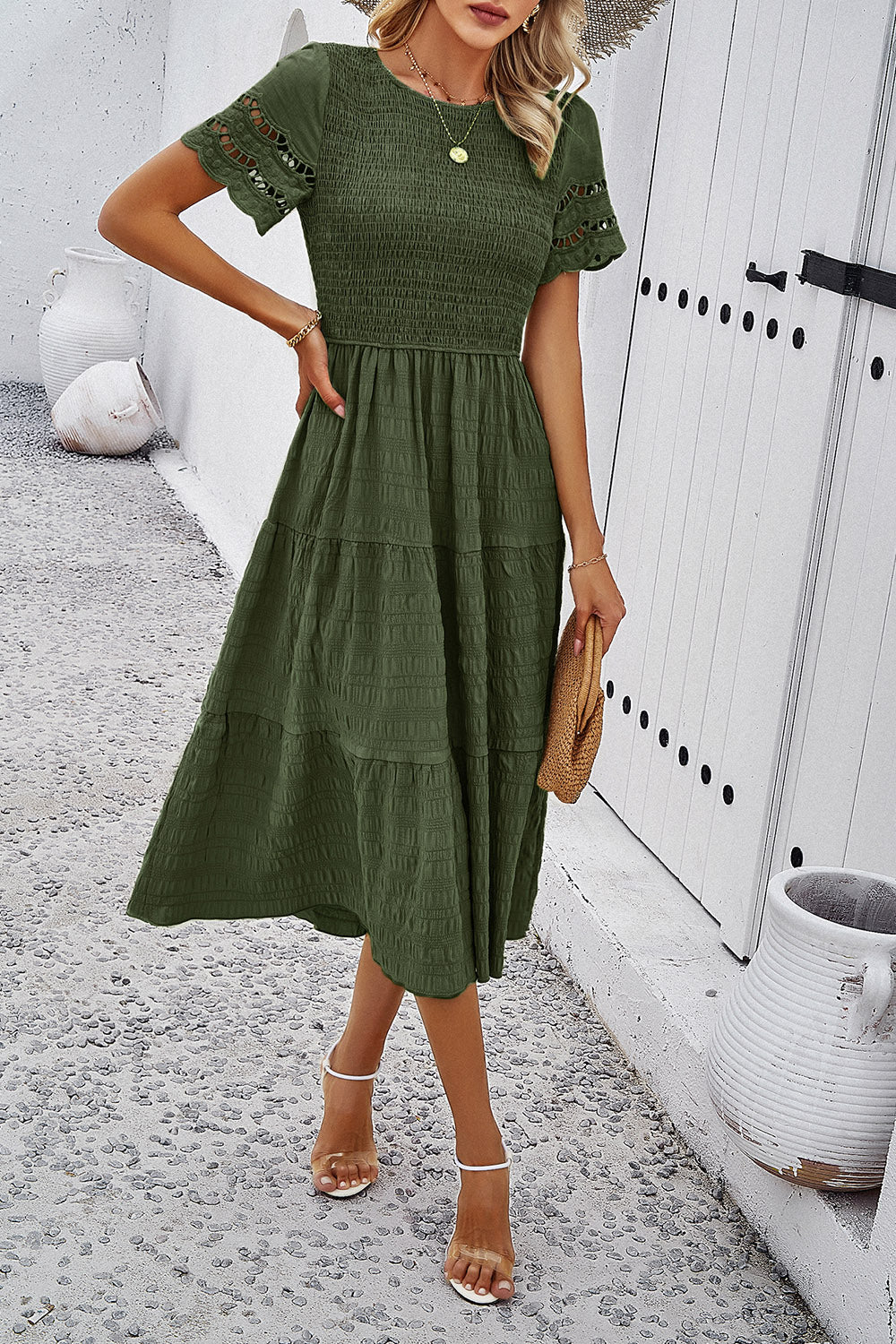 Discover elegance with our Smocked Midi Dress, perfect for any occasion. Comfort meets style in five beautiful colors.