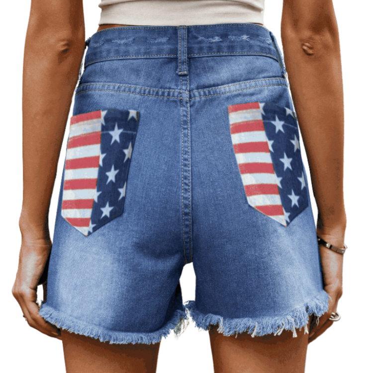 Step into the bold US Flag Distressed Denim Shorts, a perfect blend of patriotic flair and trendy style for any casual occasion.